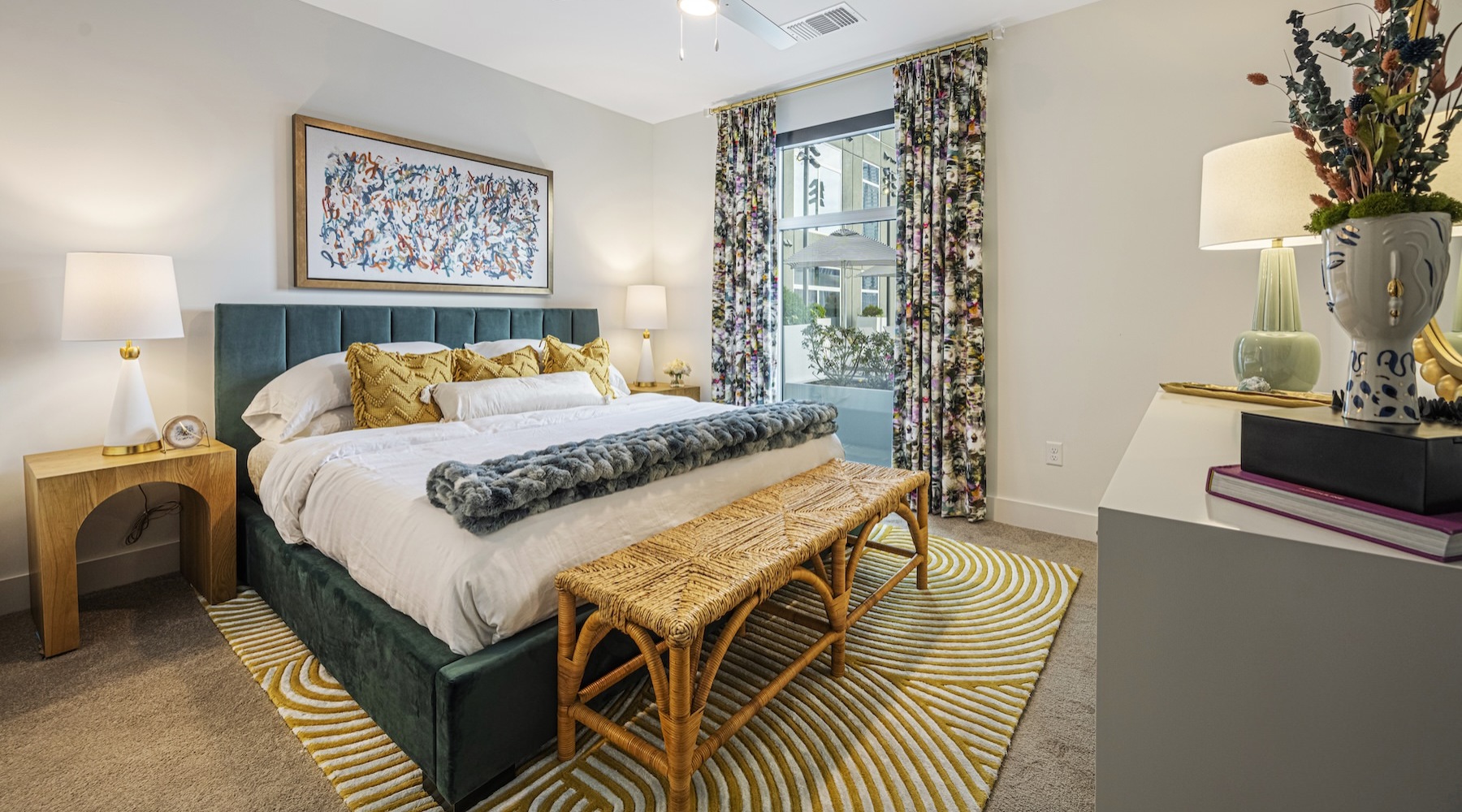 a bedroom with a bed and a dresser