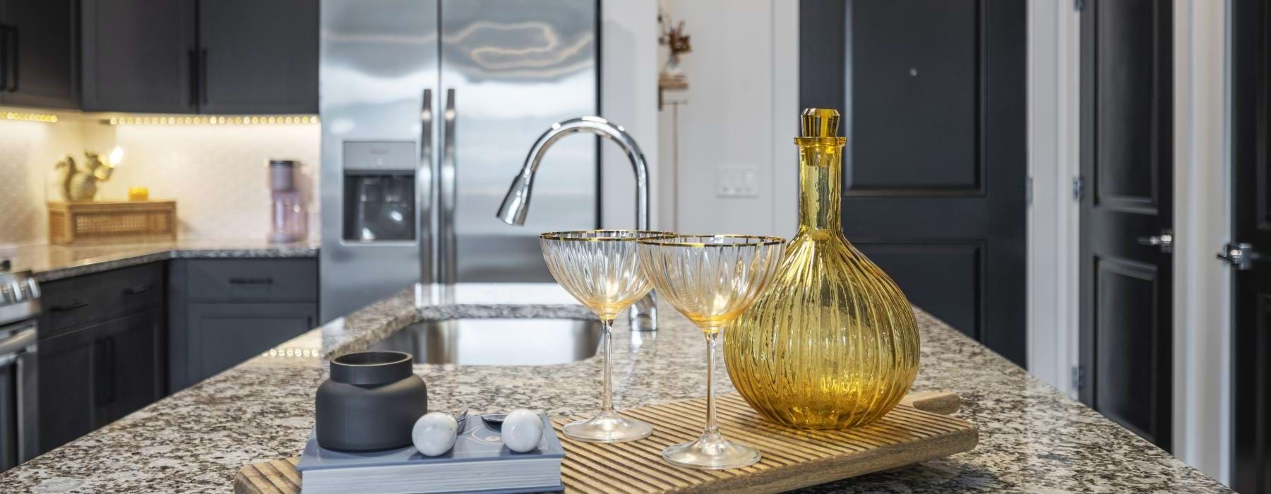 a kitchen with a marble countertop